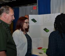 2016 ATE PI Conference   FDTC Student Booth   Ivy Wilson and Michael Davis disseminate their student projects